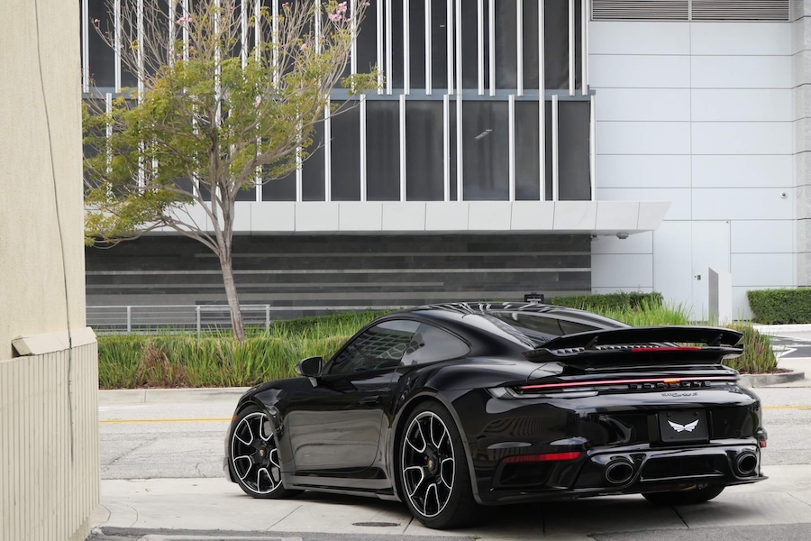 Black Porsche 911 Turbo S rear view, AWD Sports Car in Southern California