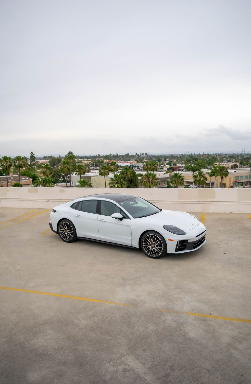 Grey Porsche Panamera, 4 doors, Black interior
