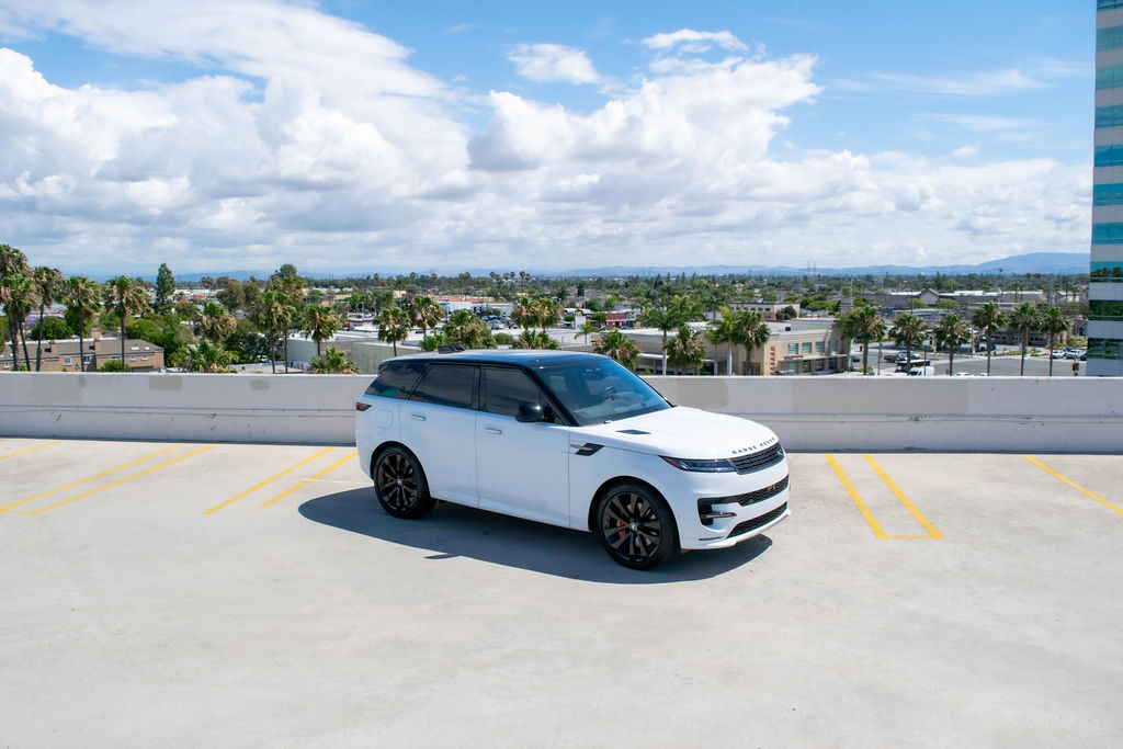 White Range Rover Sport, 5 seat Luxury SUV