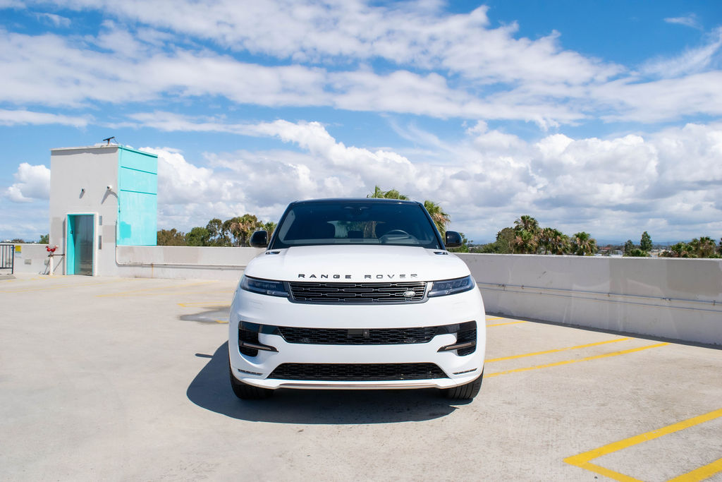 White Range Rover Sport, 4 door Luxury SUV