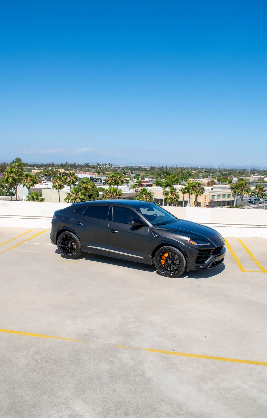 Black Lamborghini Urus with Orange interior