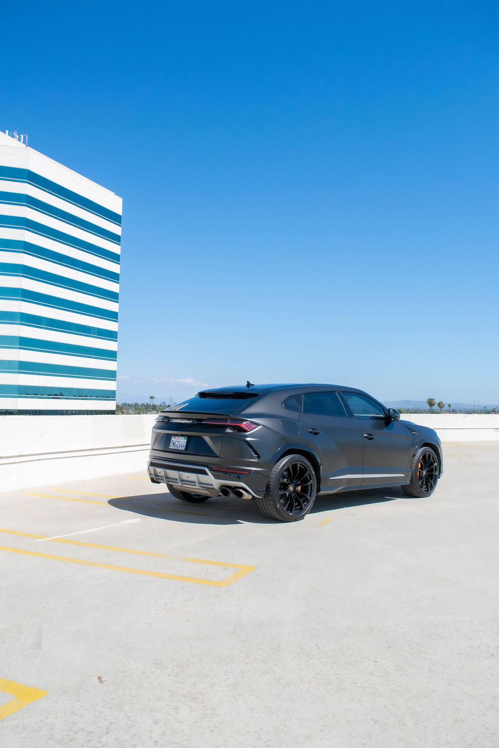 Black Lamborghini Urus 5 seat 4 door luxury SUV