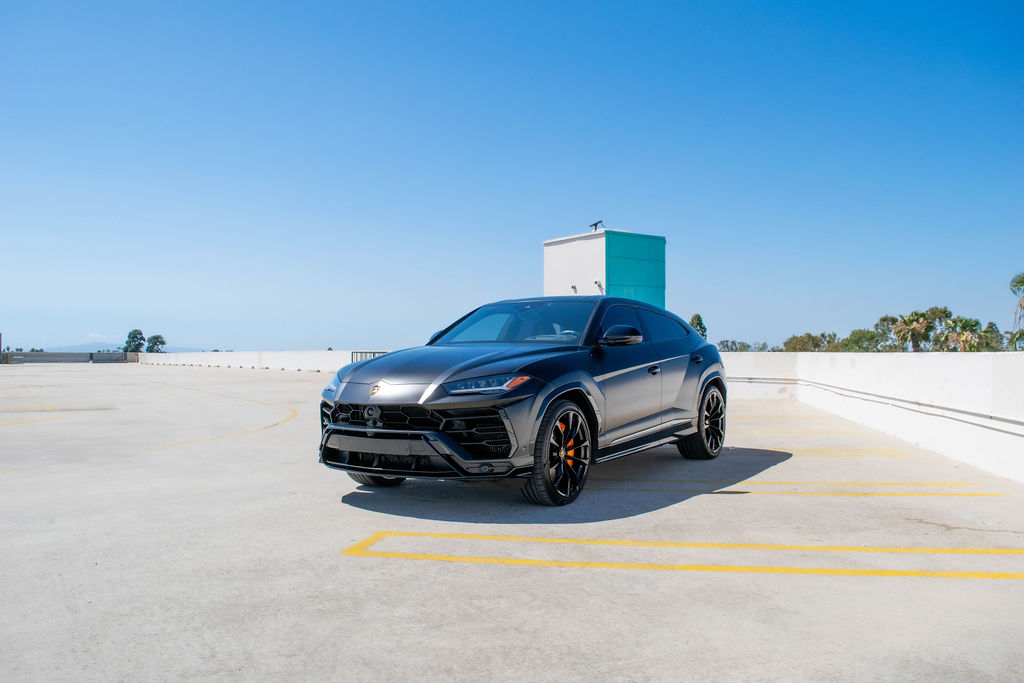 Black Lamborghini Urus AWD 5 seat luxury SUV