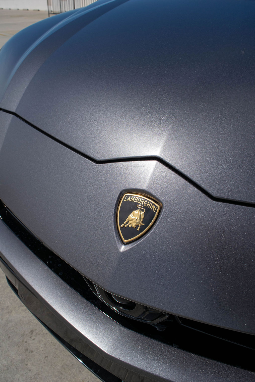 Grey Lamborghini Urus 5 seat luxury SUV available in Orange County