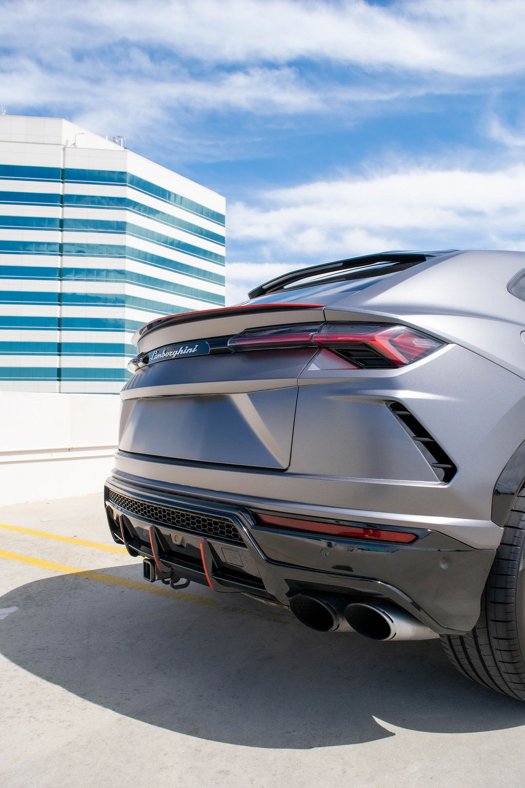 Grey Lamborghini Urus 5 seat 4 door luxury SUV