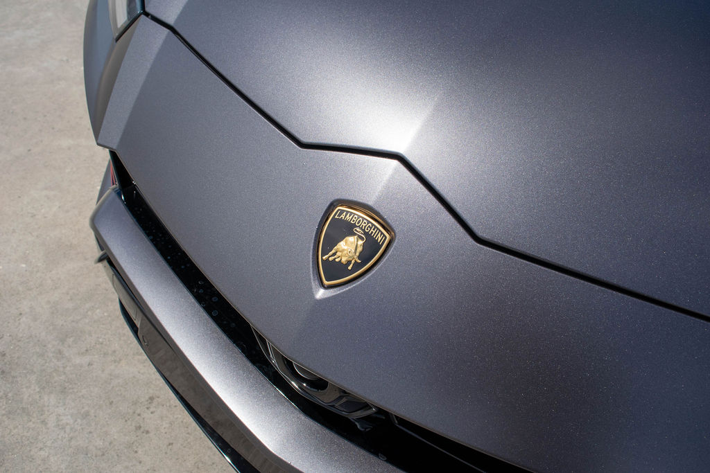 Grey Lamborghini Urus 4 door AWD luxury SUV