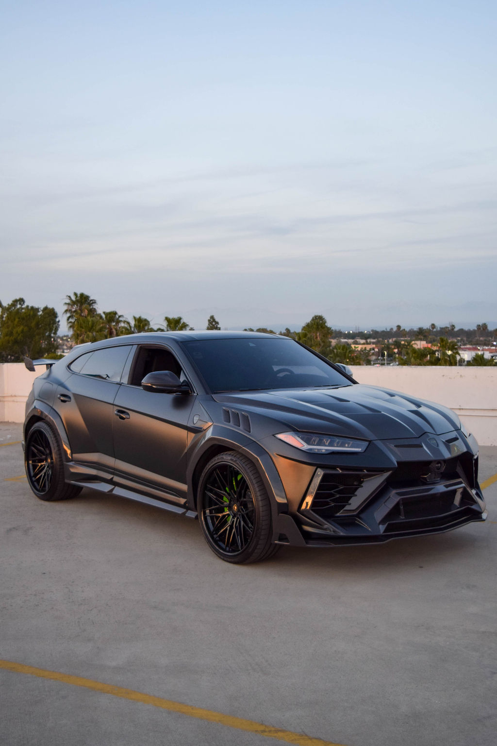 Satin Black Lamborghini Urus Mansory exotic car rental in Orange County