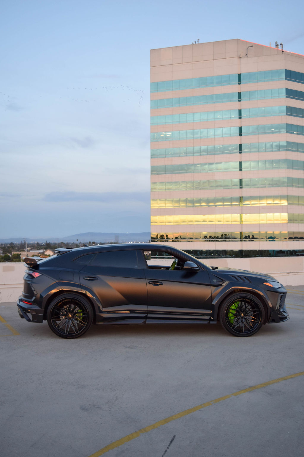 Satin Black Lamborghini Urus Mansory AWD luxury SUV with Green interior