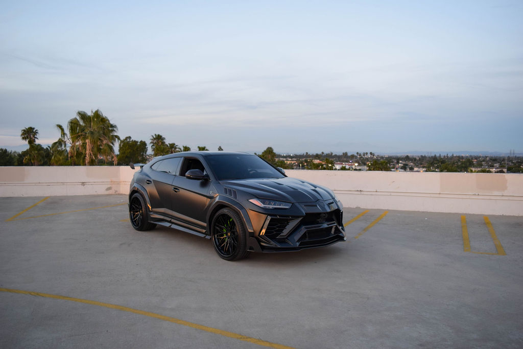 Satin Black Lamborghini Urus Mansory luxury SUV for hire in Orange County