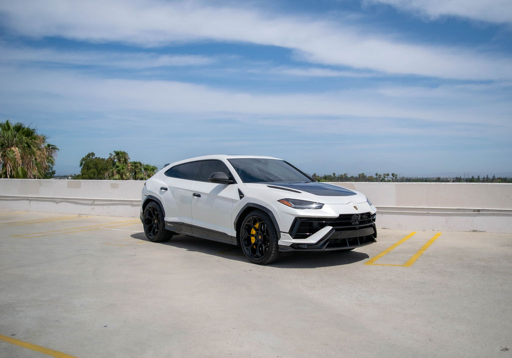 White Lamborghini Urus Performante luxury SUV for rent in Orange County