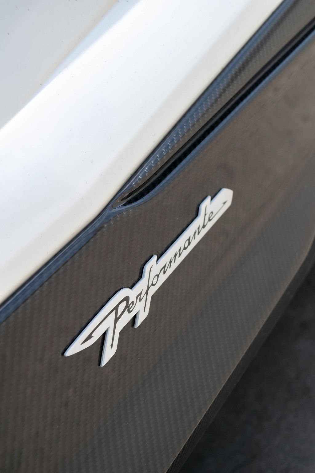 White Lamborghini Urus Performante AWD luxury SUV rental in Orange County