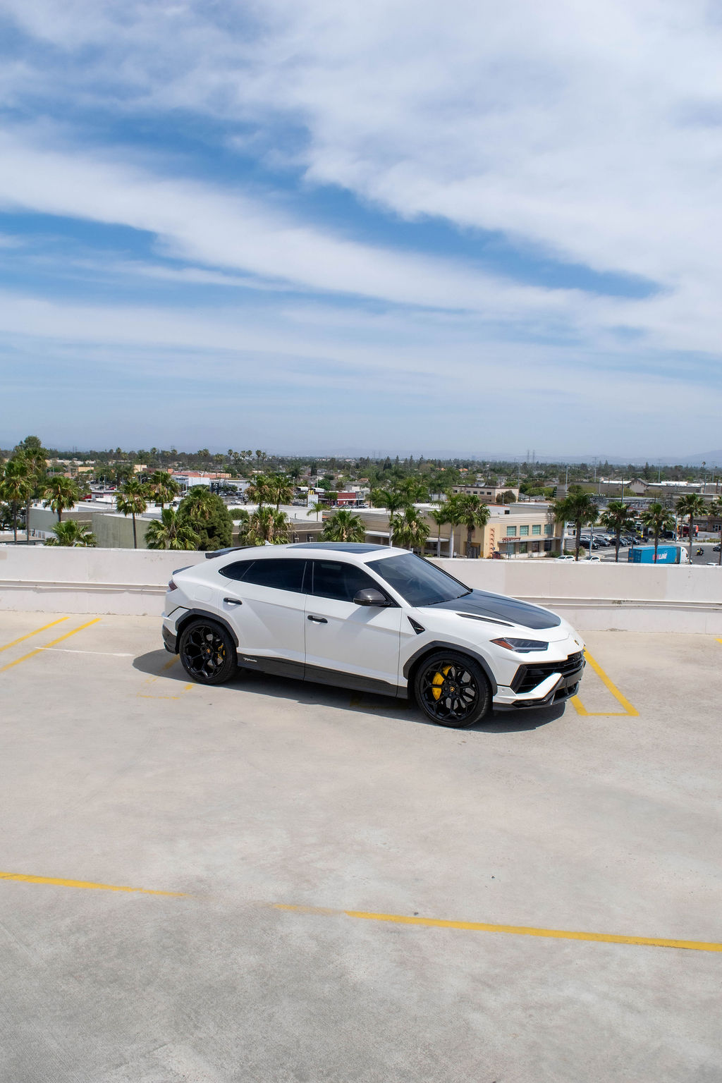 White Lamborghini Urus Performante exotic car rental in Orange County
