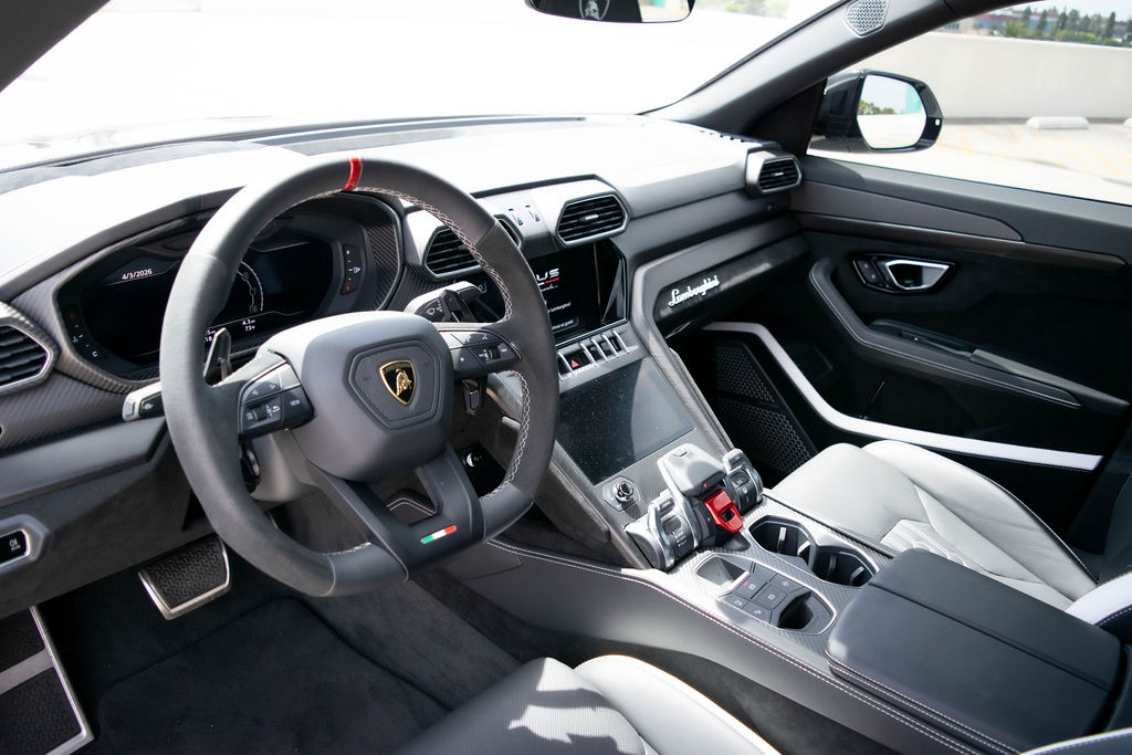 White Lamborghini Urus Performante 5 seat 4 door luxury SUV
