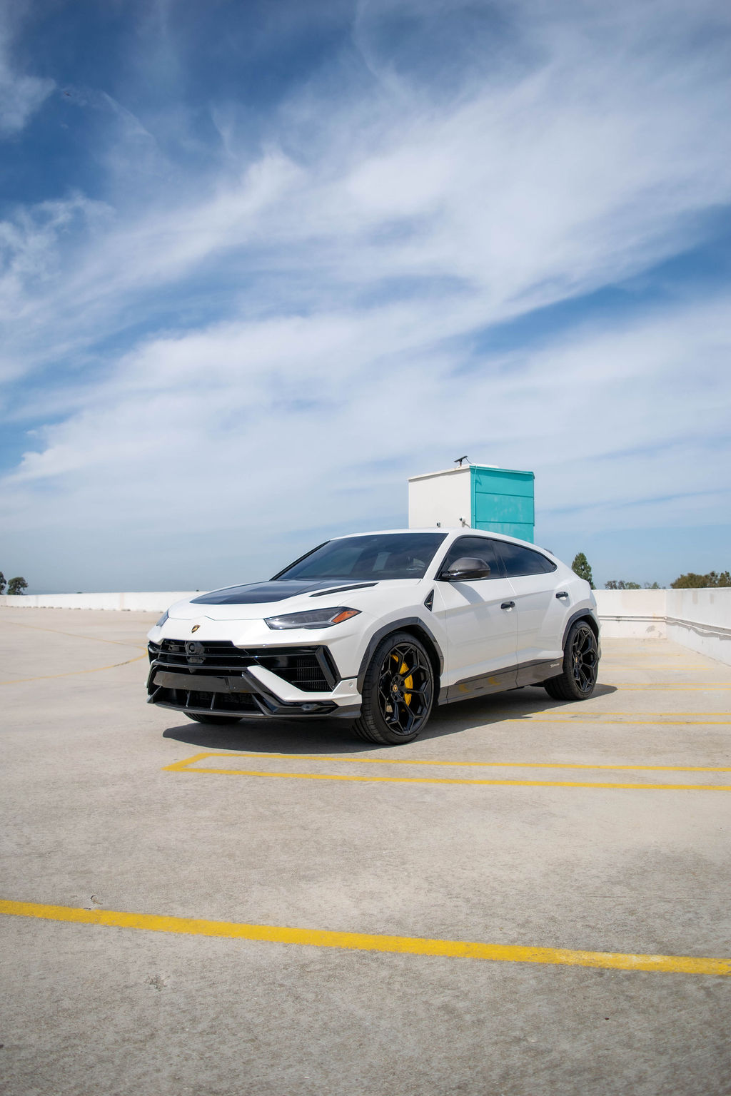 White Lamborghini Urus Performante Black and White interior, luxury SUV rental in Orange County