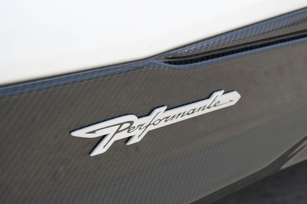 White Lamborghini Urus Performante luxury SUV rental in Orange County with Black and White interior