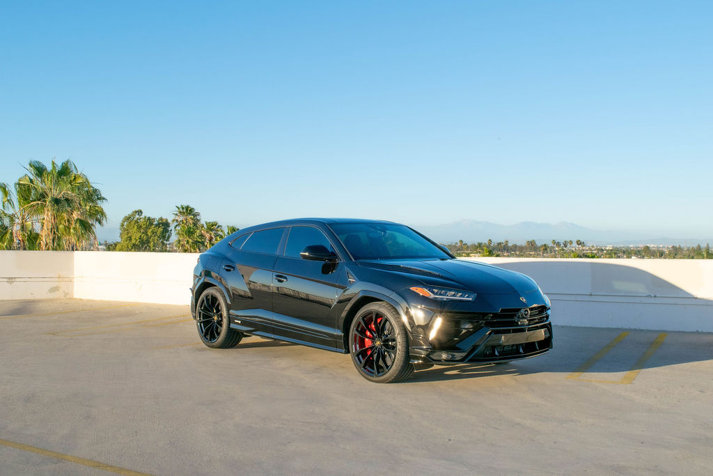 Black Lamborghini Urus S luxury SUV for rent in Orange County