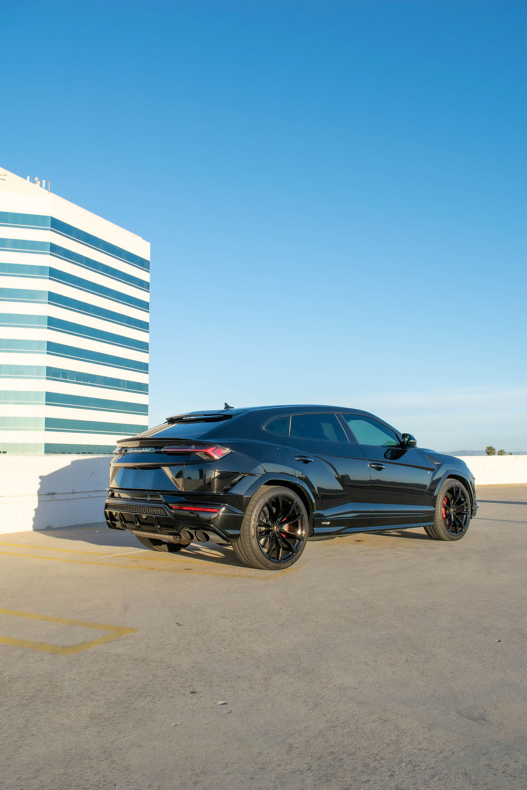 Black Lamborghini Urus S luxury SUV with Black and Red interior