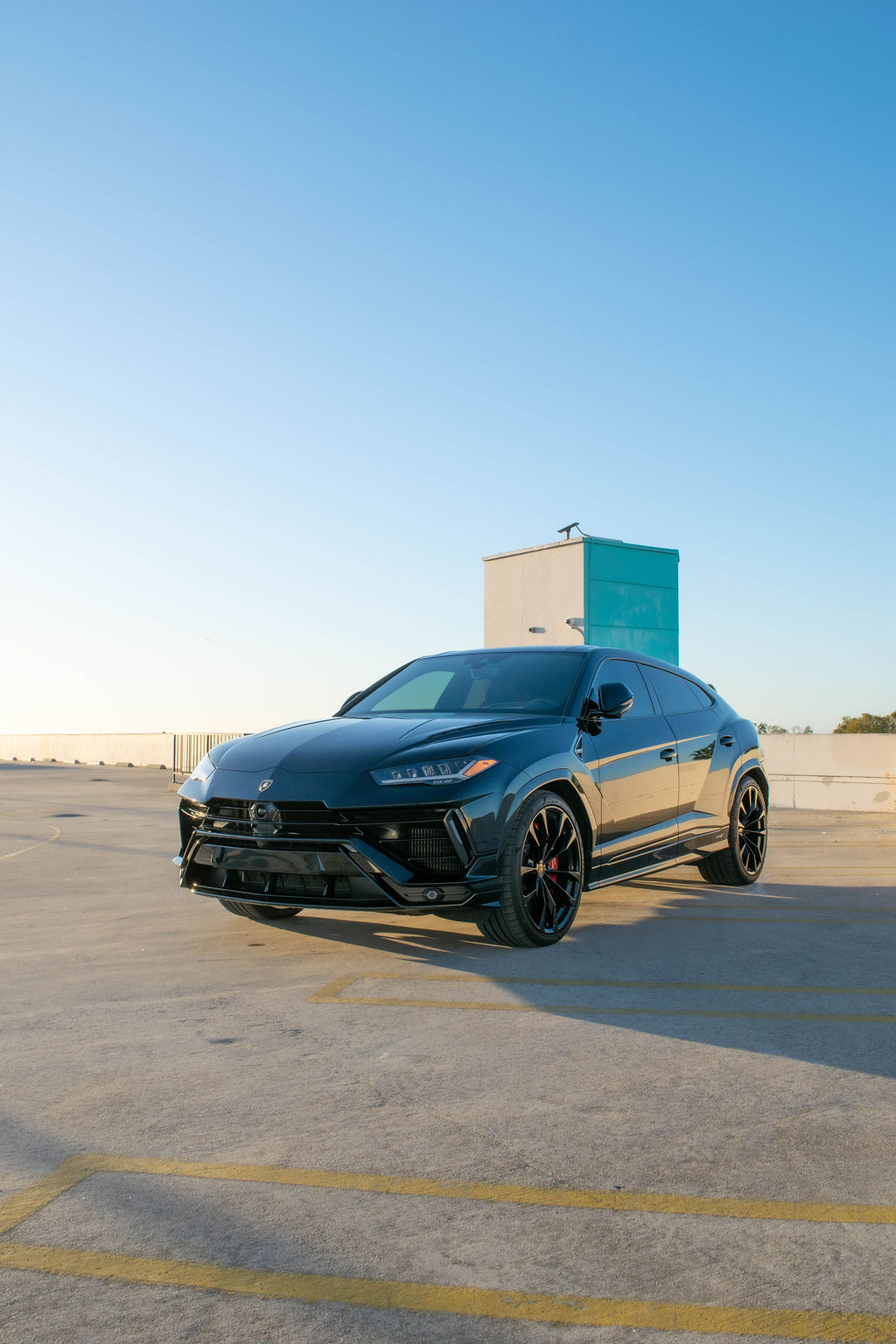 Black Lamborghini Urus S AWD luxury SUV with Black and Red interior
