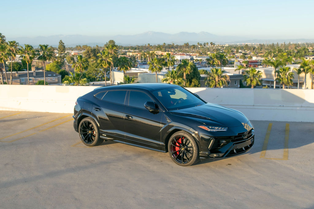 Black Lamborghini Urus S luxury SUV rental delivered in Orange County