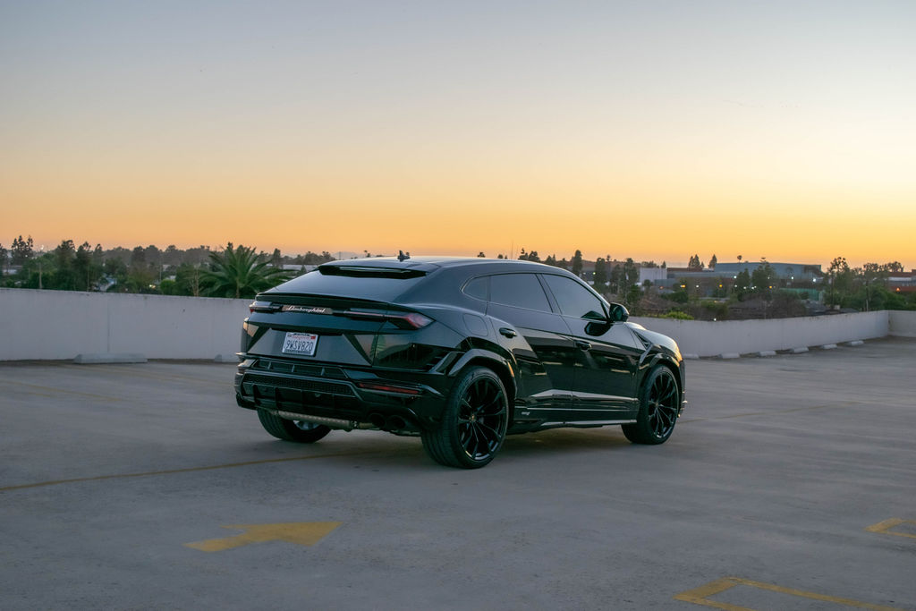 Black Lamborghini Urus S 5 seat 4 door luxury SUV