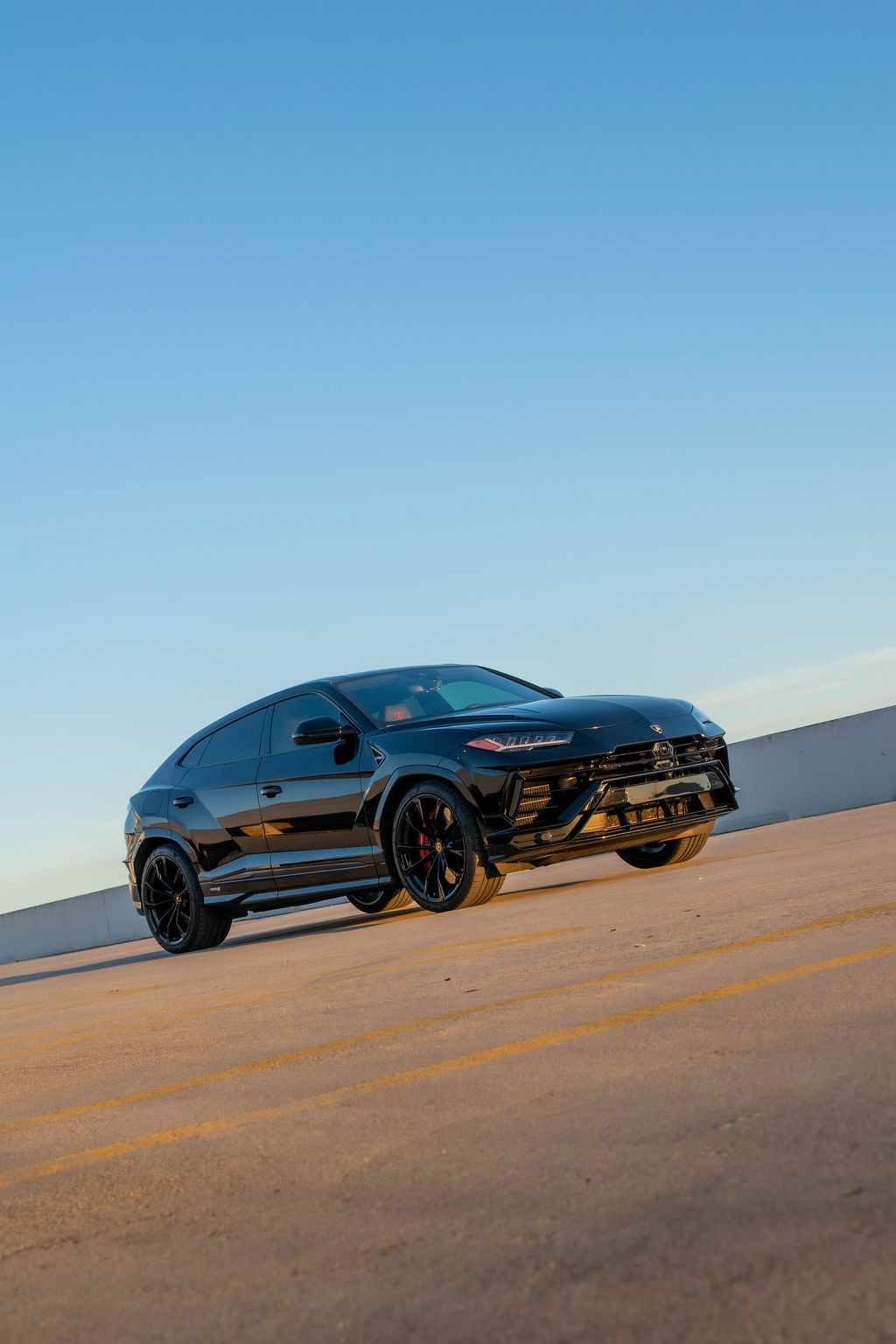 Black Lamborghini Urus S luxury SUV for hire in Orange County