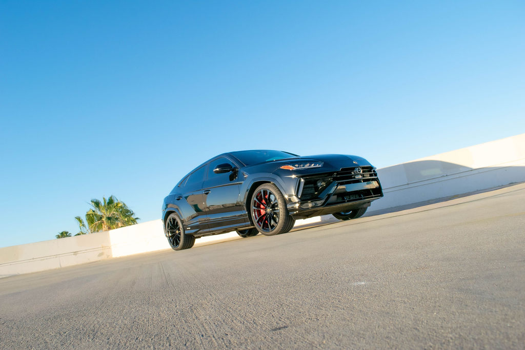 Black Lamborghini Urus S 5 seat luxury SUV with Black and Red interior