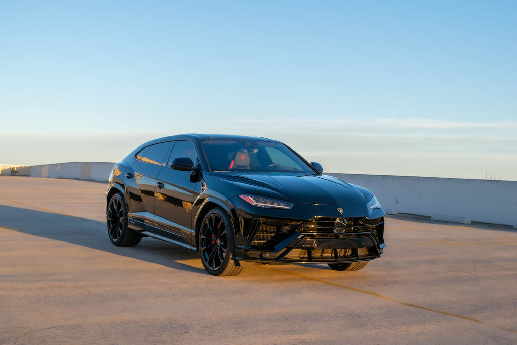 Black Lamborghini Urus S Black and Red interior luxury SUV