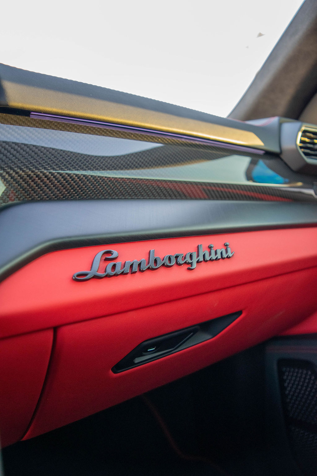 Black Lamborghini Urus S 4 door luxury SUV with Black and Red interior