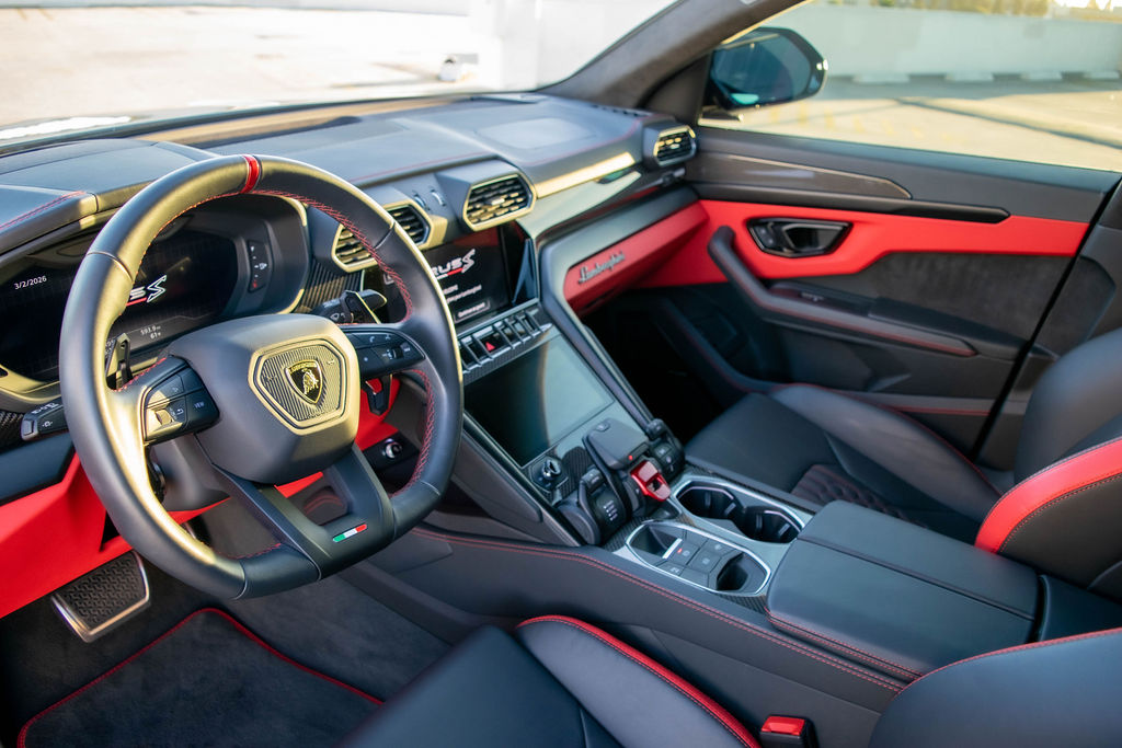 Black Lamborghini Urus S luxury SUV rental, 4 doors and Black and Red interior