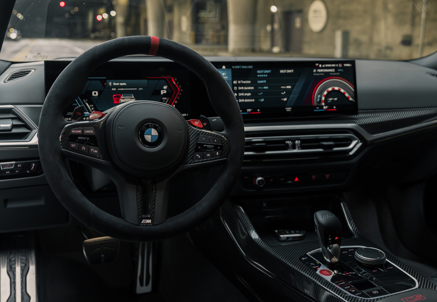 White BMW M3 CS interior steering wheel, rental in Los Angeles