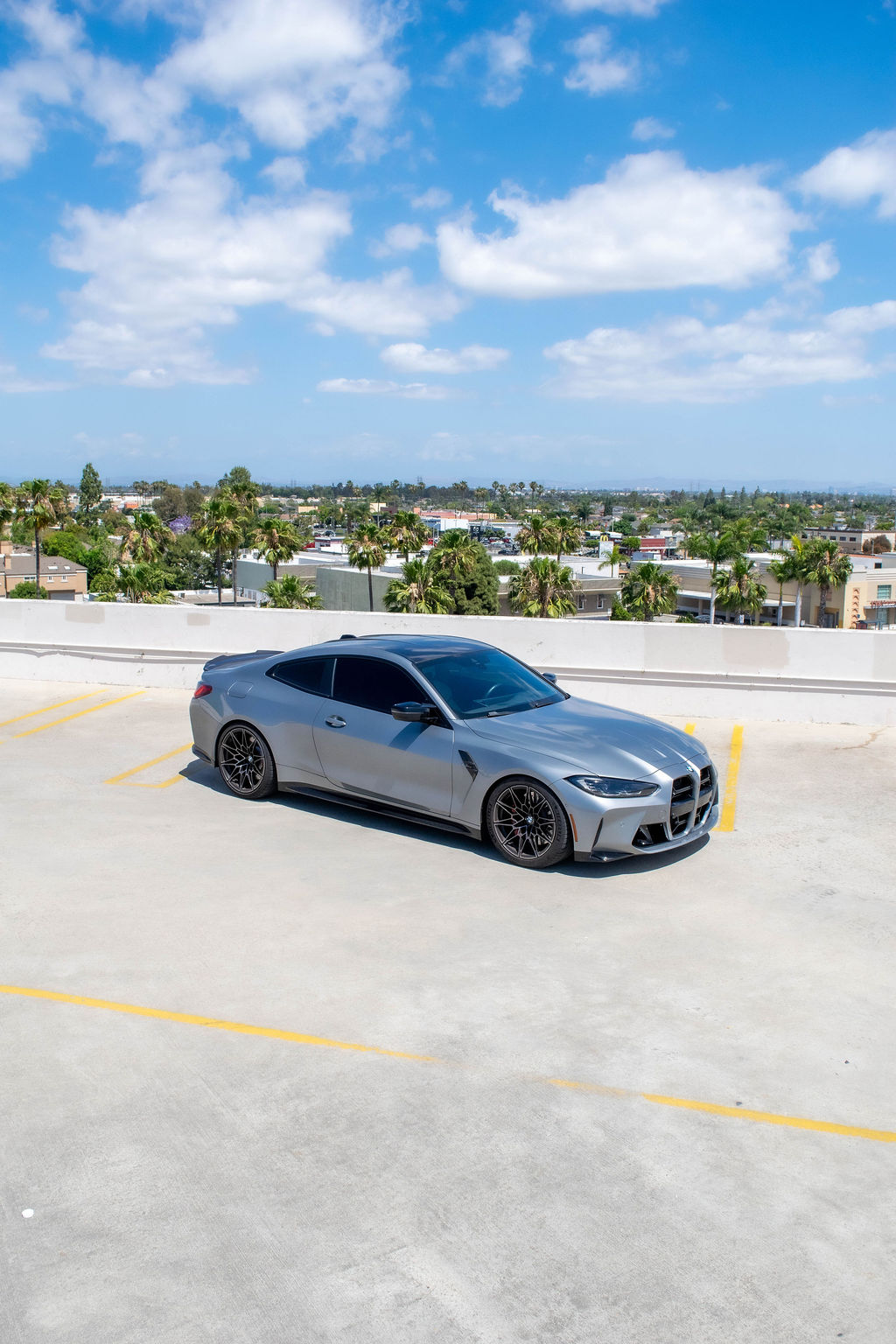 Grey BMW M4 Competition, Black and White interior, exotic car rental in Orange County