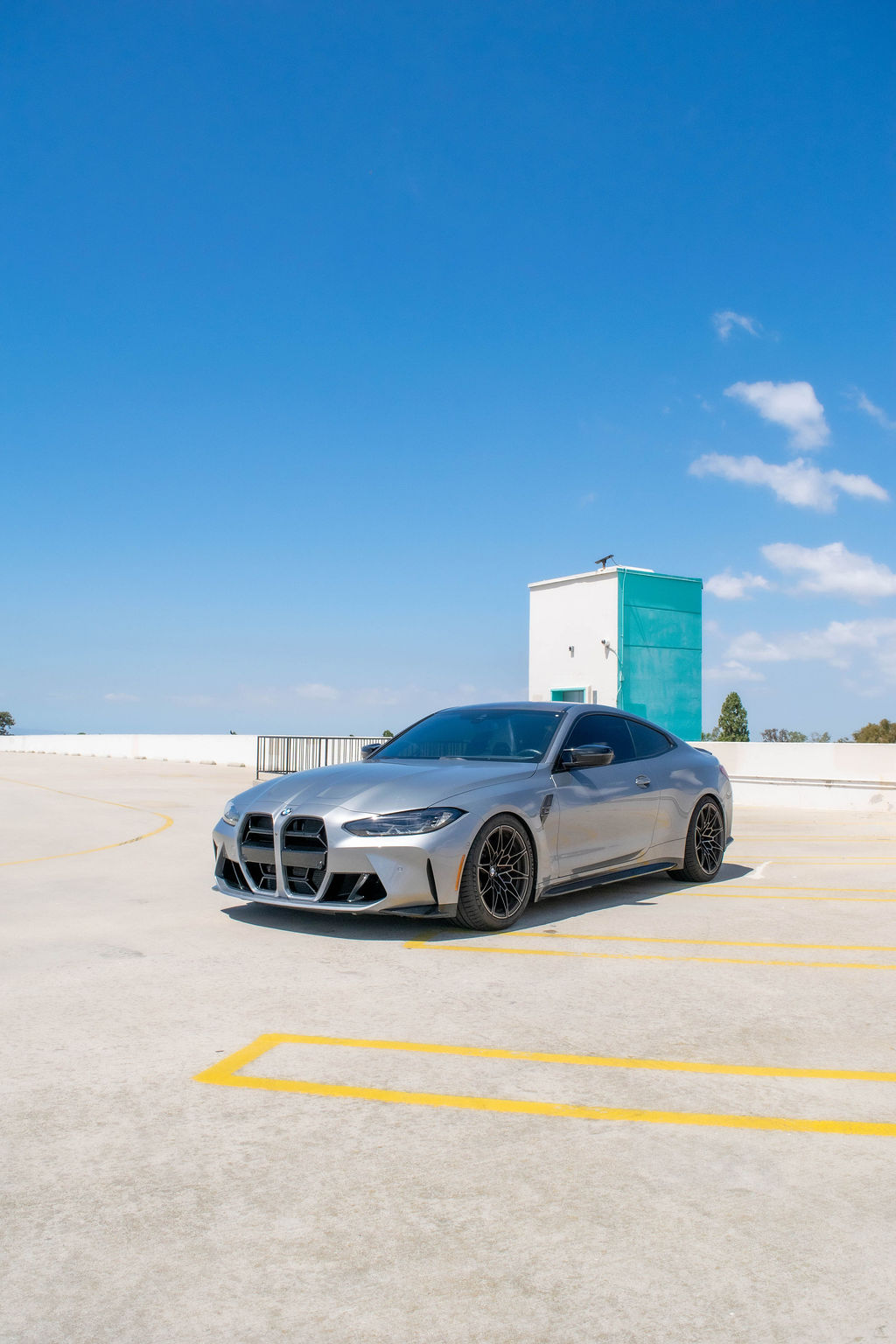 Grey BMW M4 Competition sports car, Black and White cabin, delivered in Orange County