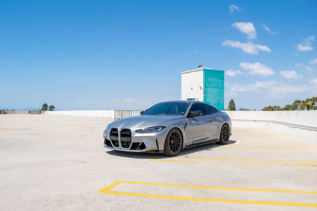 Grey BMW M4 Competition sports car with 4 seat cabin, Orange County rental