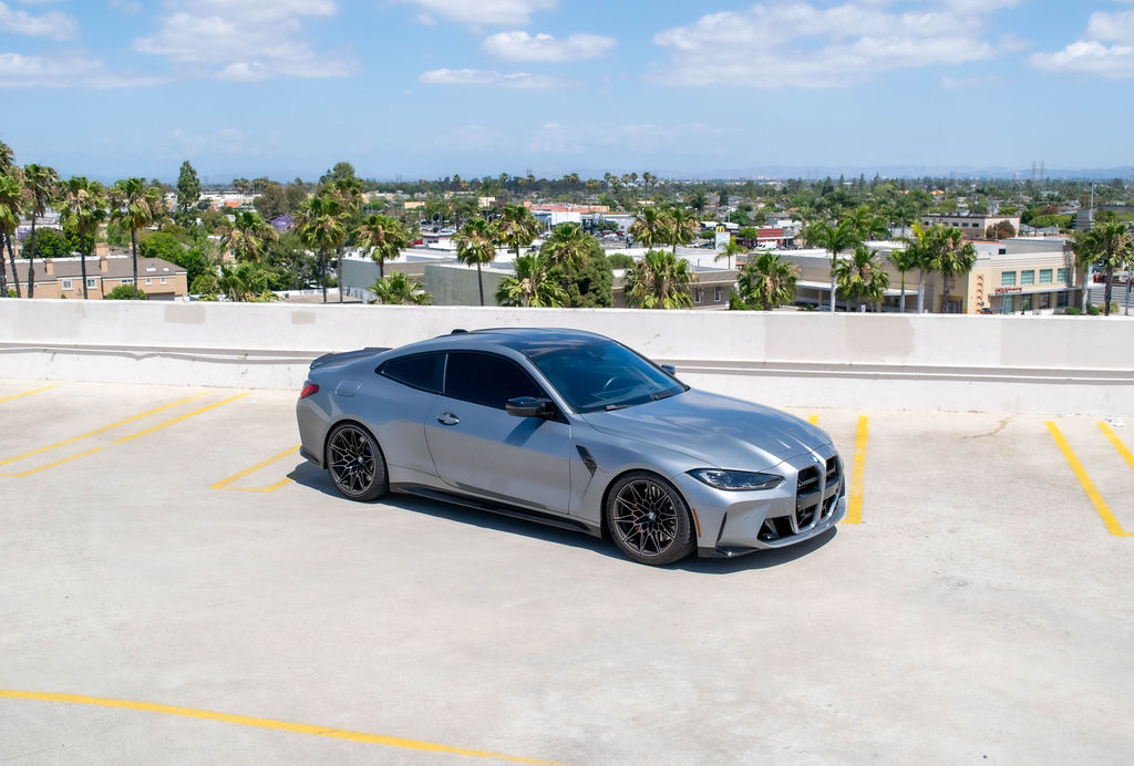 Grey BMW M4 Competition RWD sports car, exotic rental in Orange County