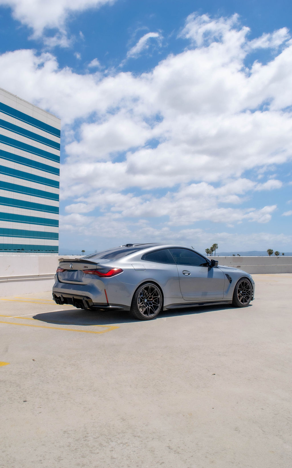 Grey BMW M4 Competition sports car for rent, 4 seats, Orange County