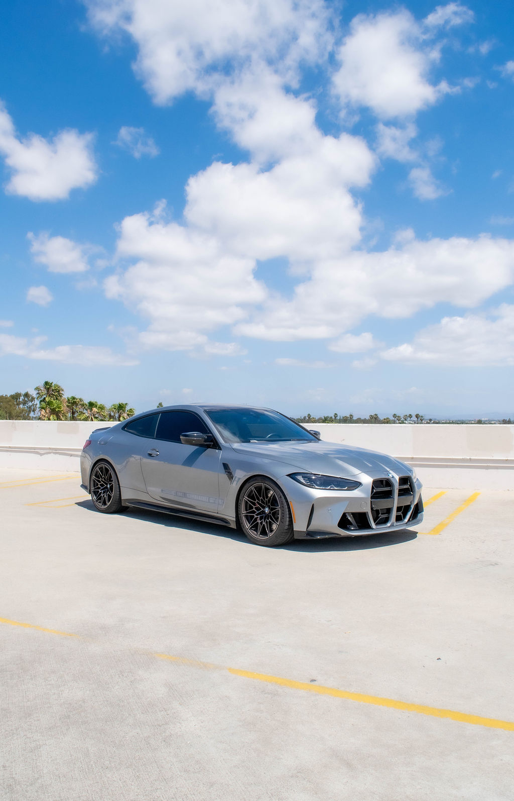 Grey BMW M4 Competition sports car rental delivered across Orange County, CA
