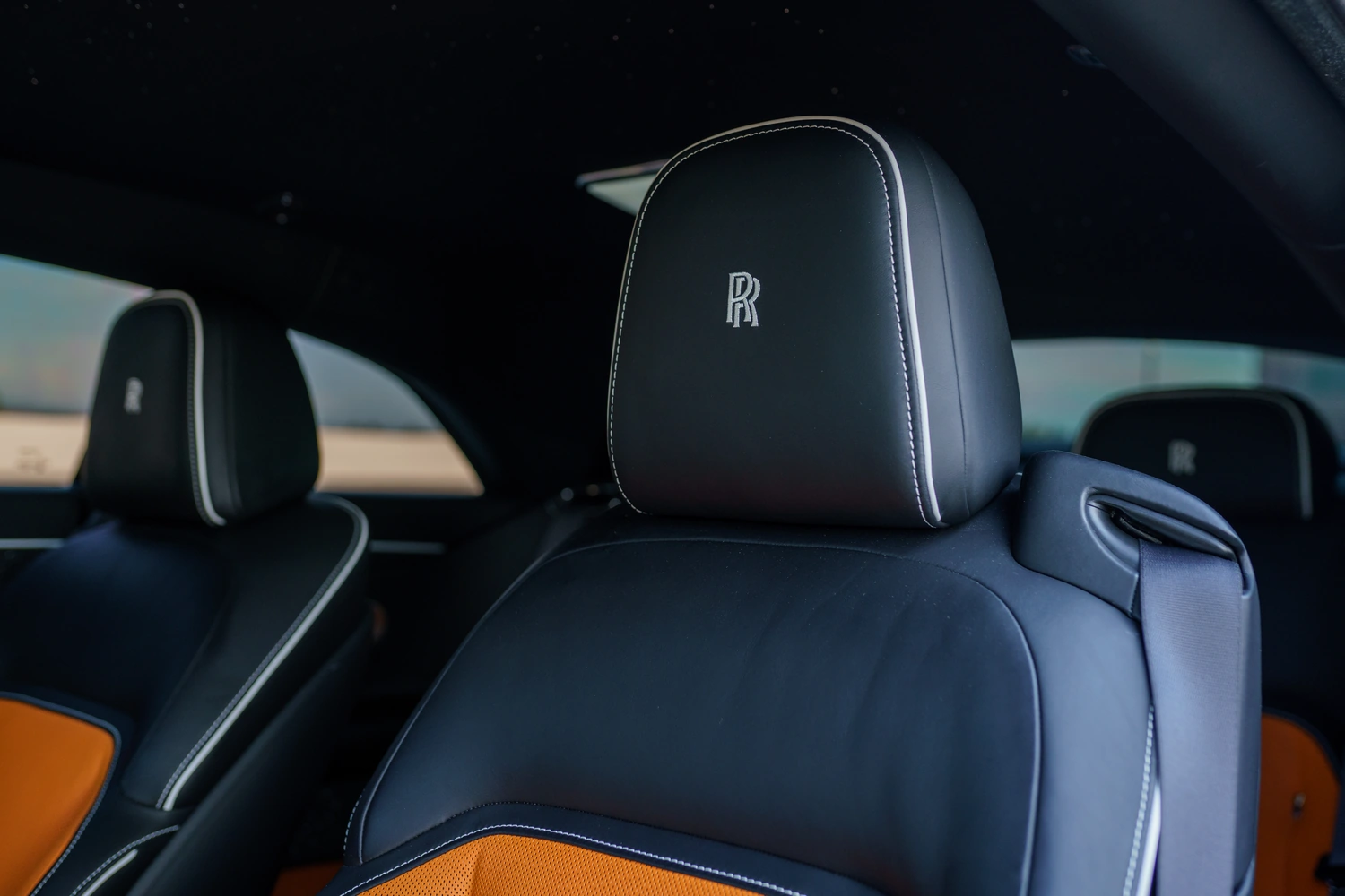 Grey Rolls Royce Spectre interior, AWD 4 seat rental