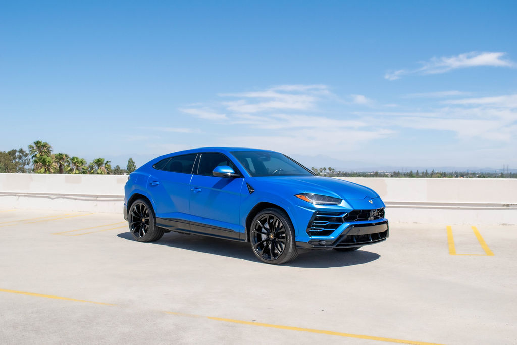 Blue Lamborghini Urus S luxury SUV for rent in Orange County
