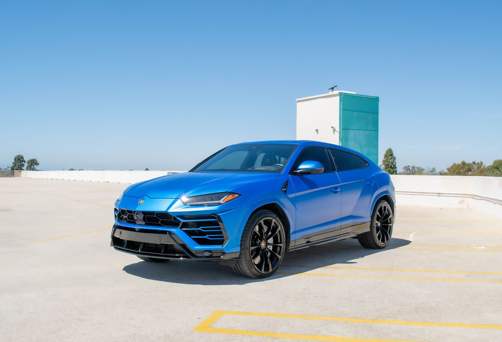 Blue Lamborghini Urus S 5 seat luxury SUV available in Orange County