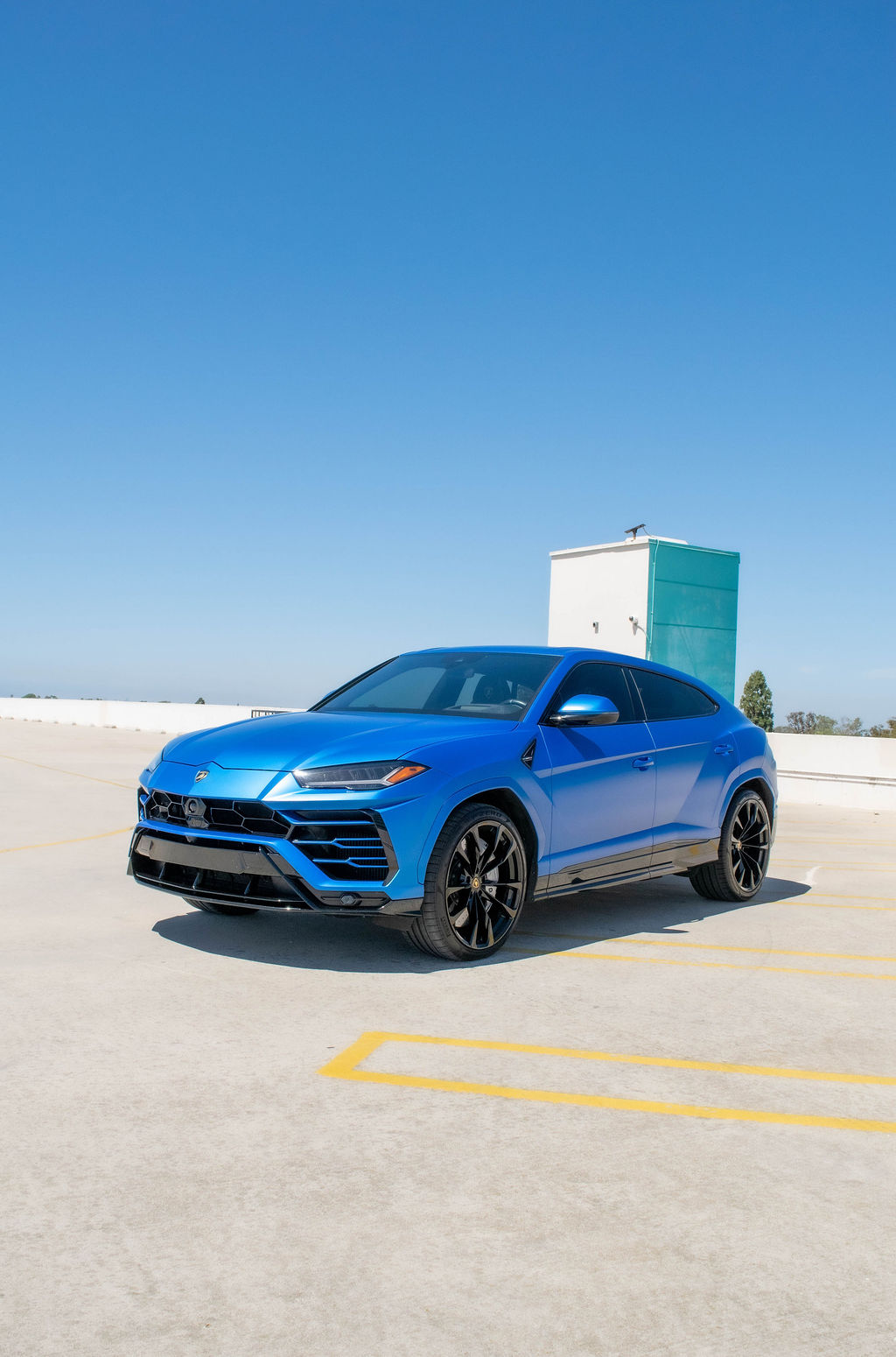 Blue Lamborghini Urus S AWD luxury SUV available in Orange County