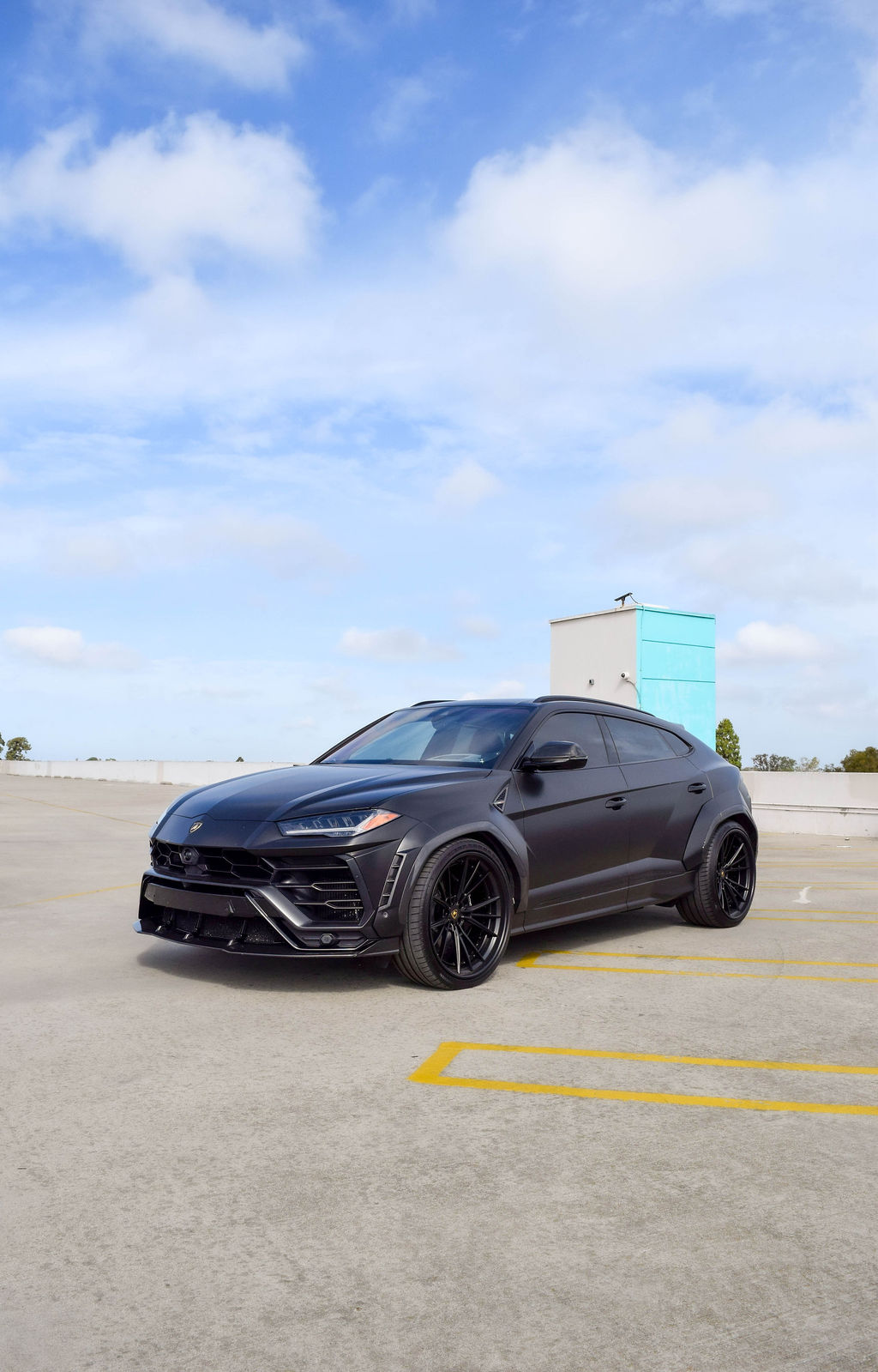 Satin Black Lamborghini Urus Widebody with Red interior
