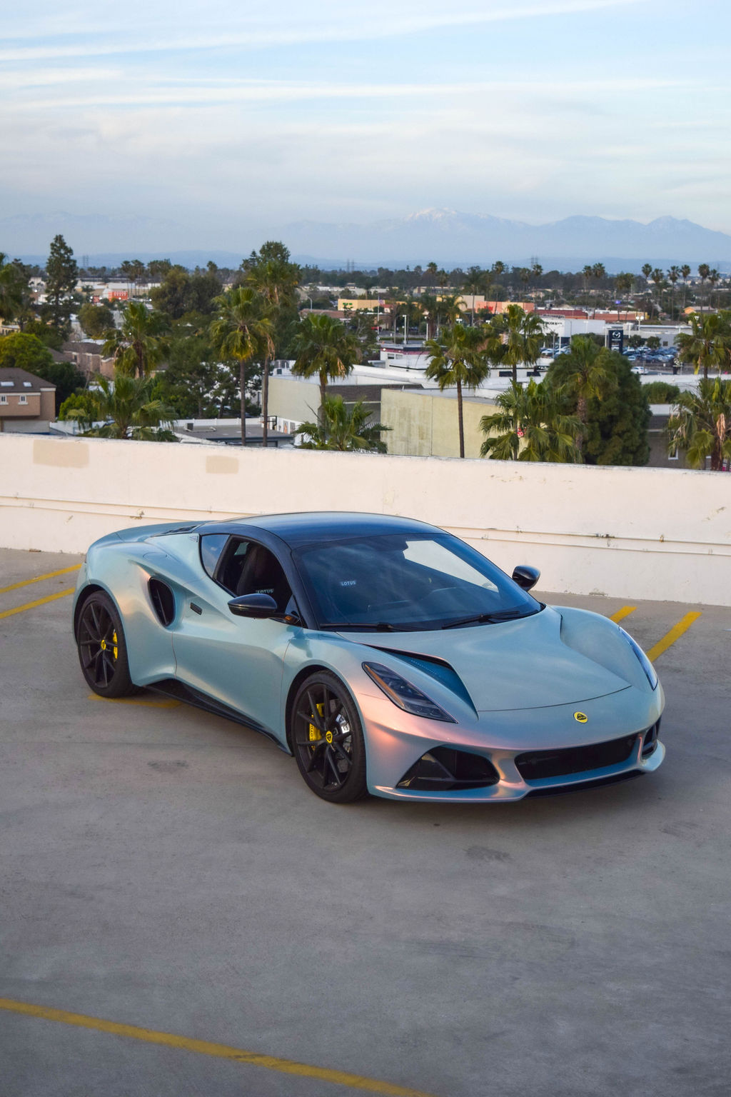 Multi-Color Lotus Emira V4 sports car available to rent in Orange County