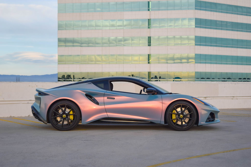 Multi-Color Lotus Emira V4 sports car rental, 2 doors and Black interior