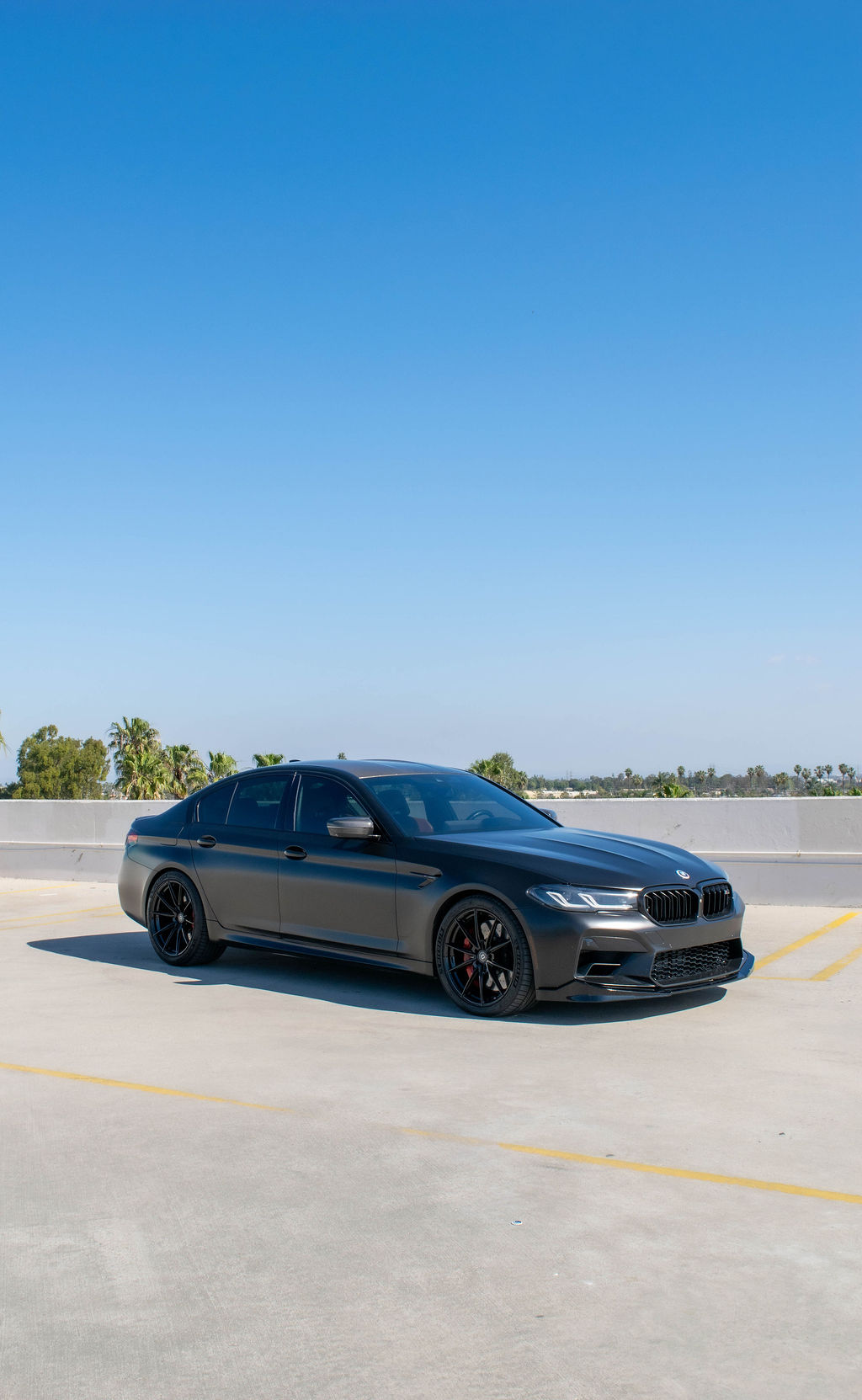 Black BMW M5 Competition sports car rental delivered across Orange County, CA