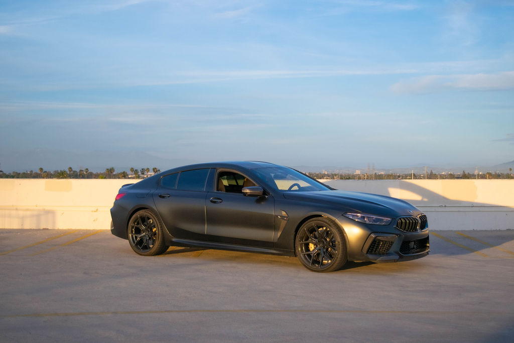 BMW M8 Competition finished in Satin Black, Brown interior, rent in Orange County