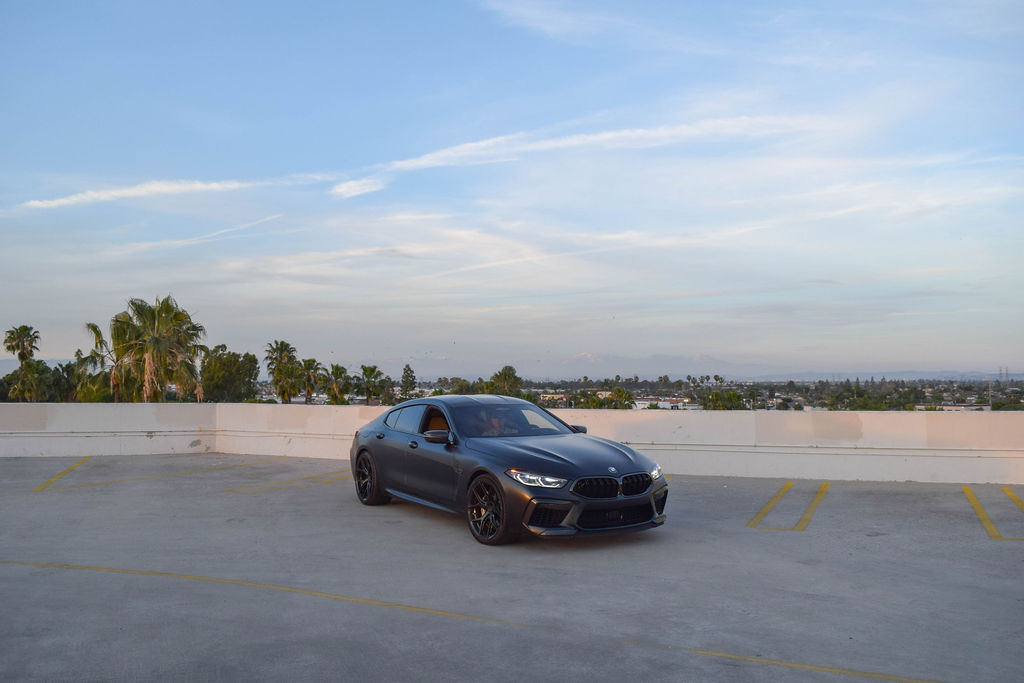 Satin Black BMW M8 Competition sports car for rent, 4 seats, Orange County