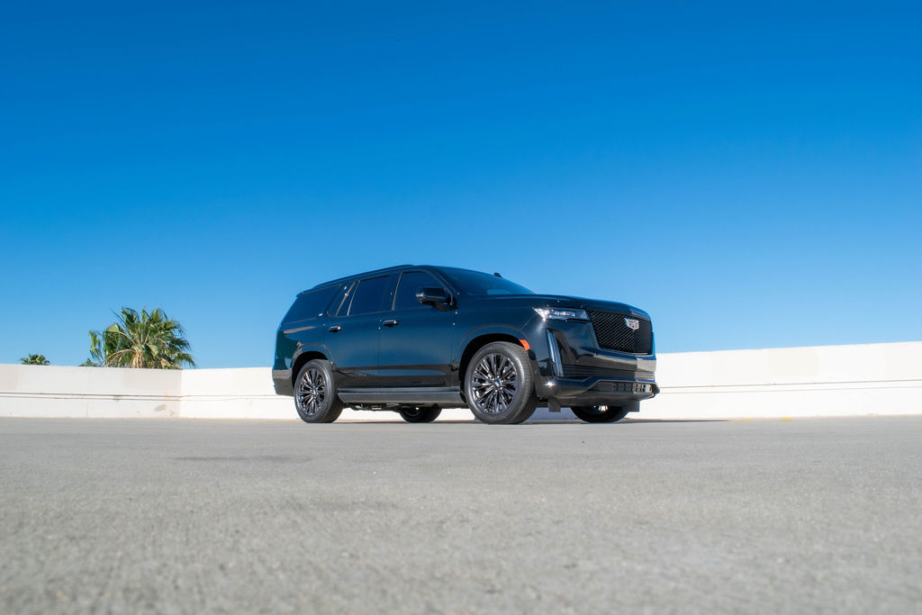 Black Cadillac Escalade ESV Sport luxury SUV for rent, 7 seats, Orange County