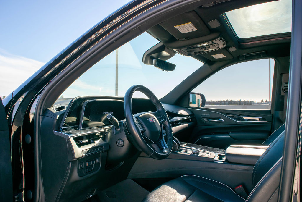 Black Cadillac Escalade ESV Sport luxury SUV on rent in Orange County, Black interior