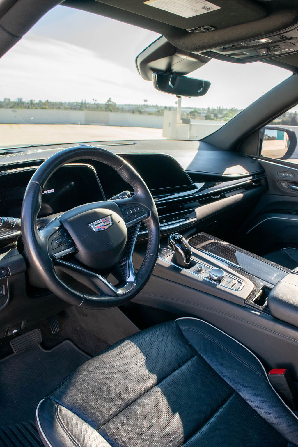 Black Cadillac Escalade ESV Sport, 7 seat luxury SUV rental in Orange County