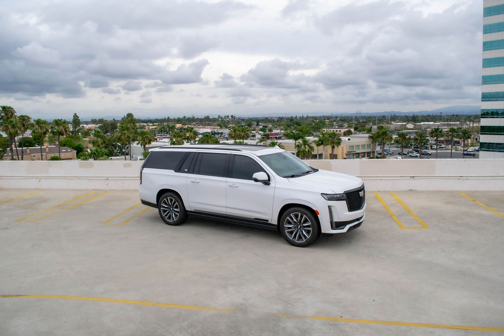 White Cadillac Escalade ESV Sport Platinum, Black interior, exotic car rental in Orange County